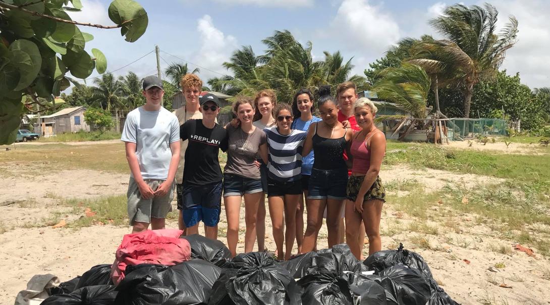 Cleaning the beach is an important part of marine conservation volunteering in Belize. Projects Abroad volunteers helped cleaning the beach in Belize as part of their marine conservation efforts to keep the ocean clean.